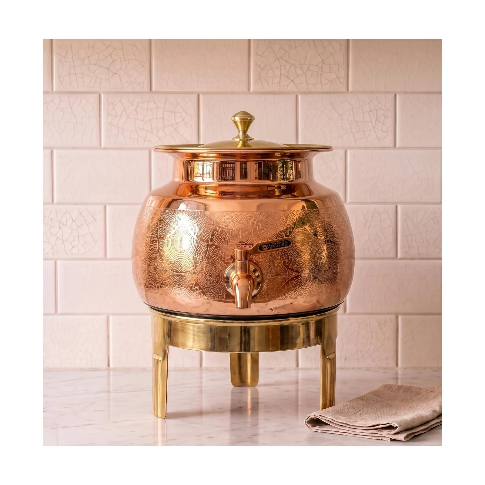 Pure Copper Water Dispenser Matka – Floral Etched Finish – Slide 1 Pure Copper Water Dispenser Matka Pot with Brass Stand and Tap Floral Etched Finish Slide 1 (99.51% Certified Pure Copper)